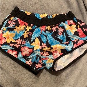 Black and floral surf shorts